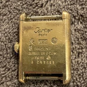 Ladies Cartier watch. No band, sitting in my jewellery box for years.